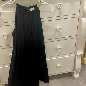 Michael Kors dress with gold chain strap detailing.